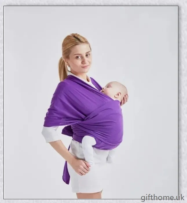 A cosy and comfortable baby carrier sling in a stylish design, perfect for hands-free parenting during family adventures
