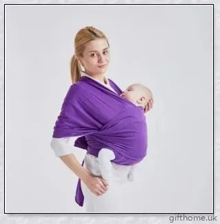 A cosy and comfortable baby carrier sling in a stylish design, perfect for hands-free parenting during family adventures