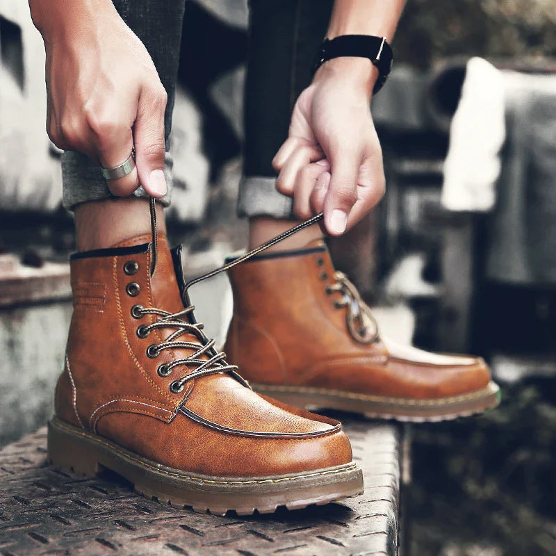 A pair of stylish and comfortable Martin boots for men, featuring a sleek PU upper and a durable rubber sole for everyday casual wear.