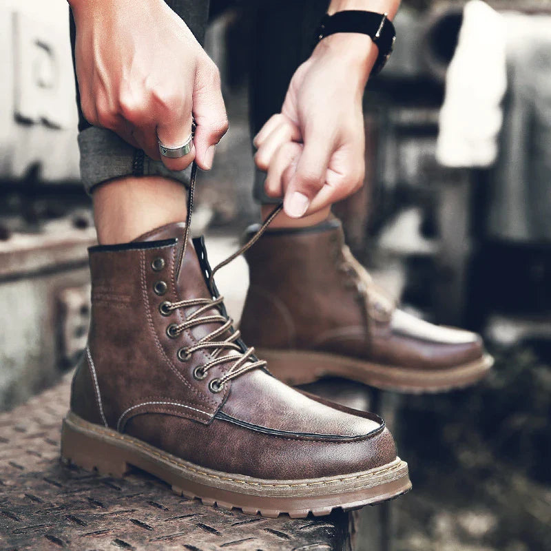 A pair of stylish and comfortable Martin boots for men, featuring a sleek PU upper and a durable rubber sole for everyday casual wear.