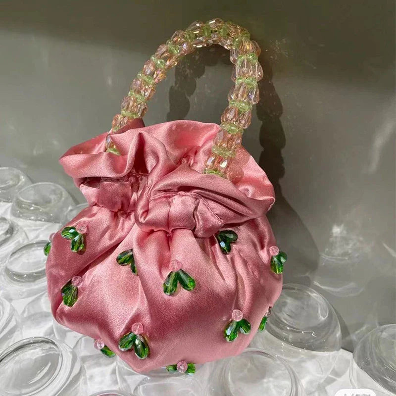 Handmade glass crystal beaded handbag in a chic floral pattern, perfect for formal events and everyday style