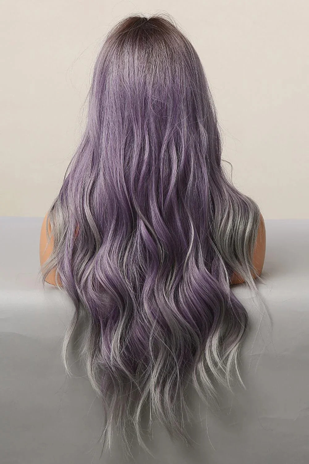 Elegant wave full-machine synthetic wig in a stunning purple and grey ombré colour, with a 26-inch length for a dramatic, full-bodied style.