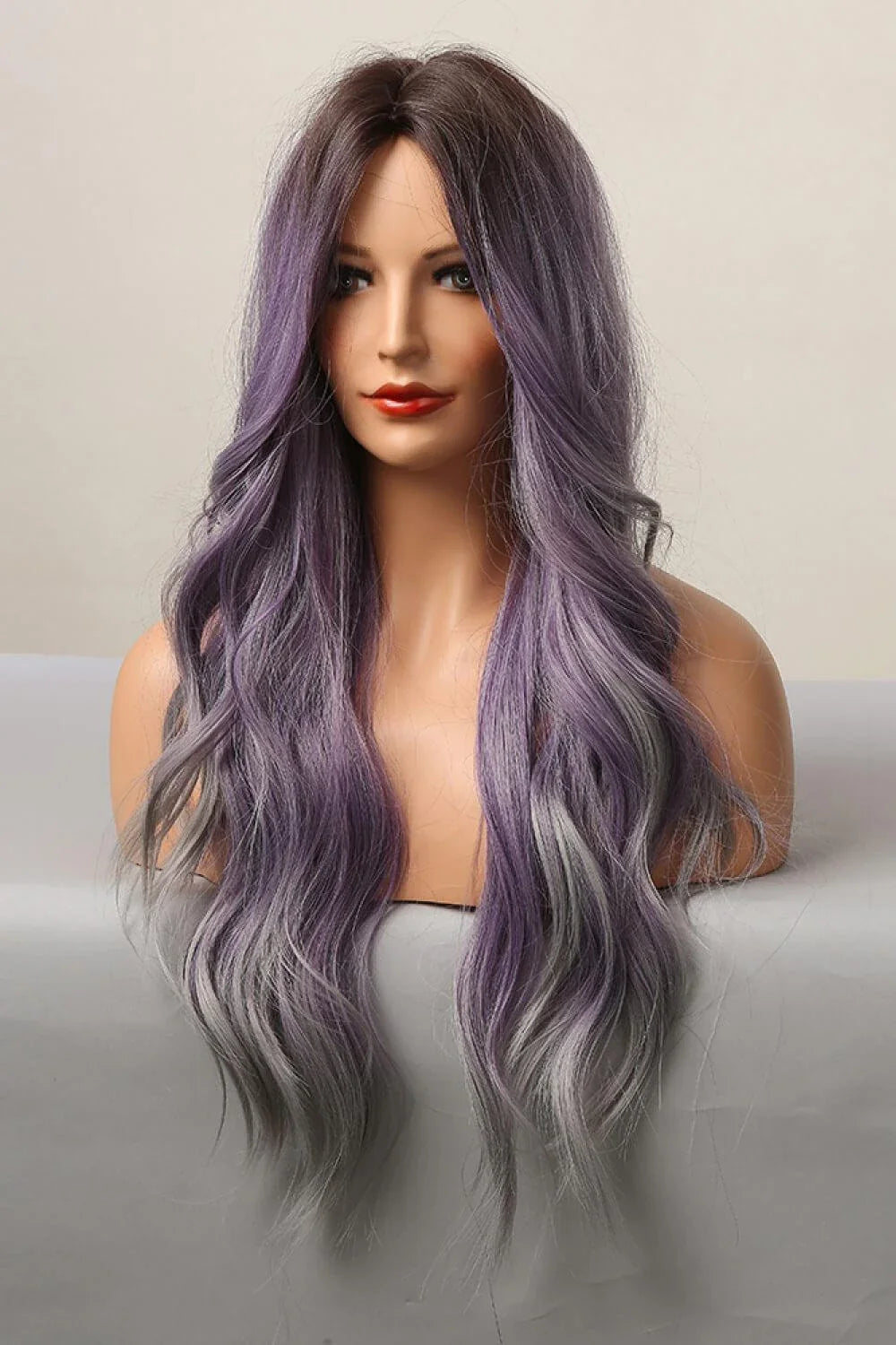 Elegant wave full-machine synthetic wig in a stunning purple and grey ombré colour, with a 26-inch length for a dramatic, full-bodied style.