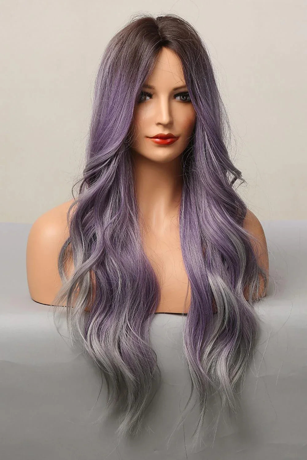 Elegant wave full-machine synthetic wig in a stunning purple and grey ombré colour, with a 26-inch length for a dramatic, full-bodied style.