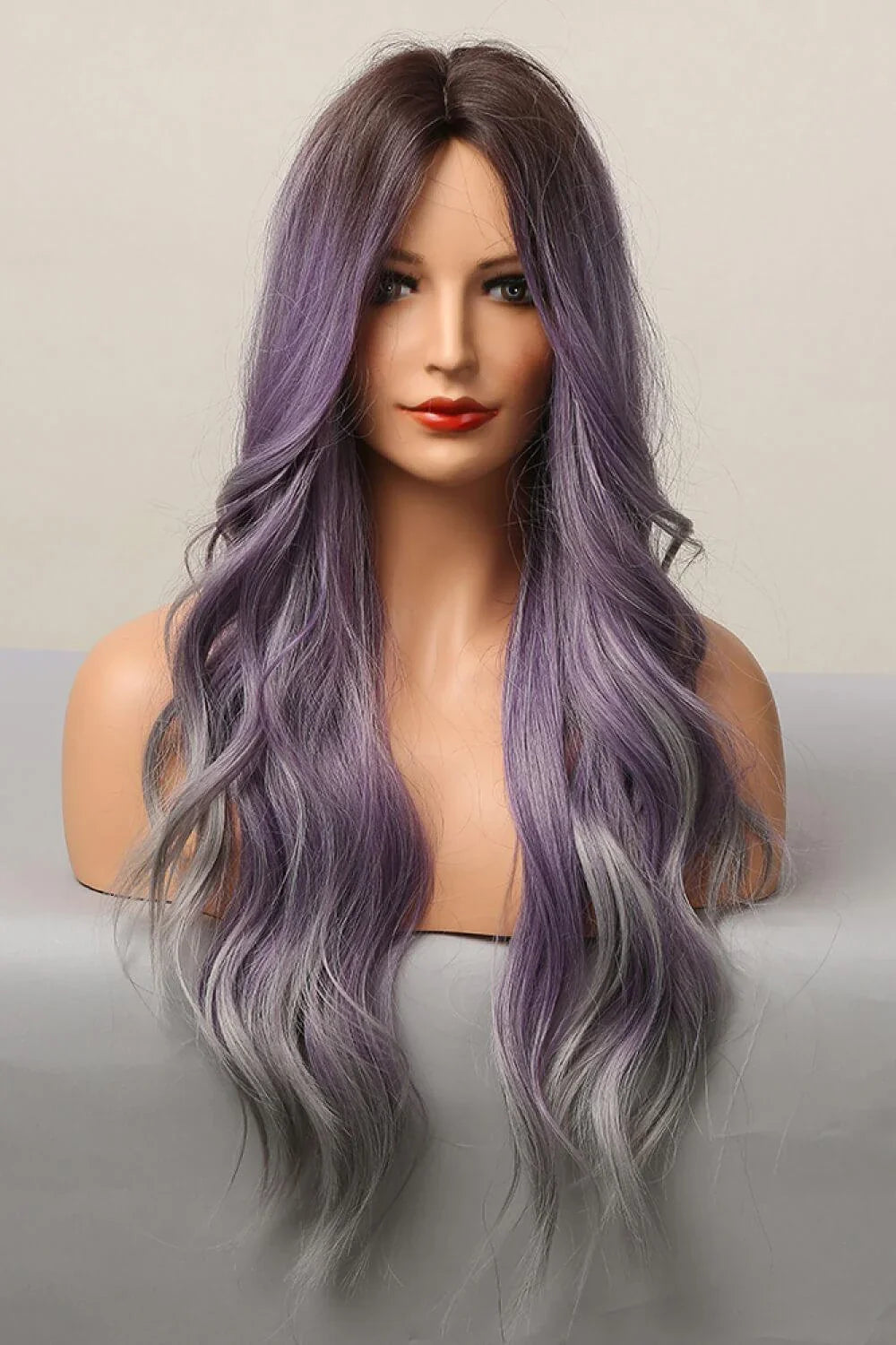 Elegant wave full-machine synthetic wig in a stunning purple and grey ombré colour, with a 26-inch length for a dramatic, full-bodied style.