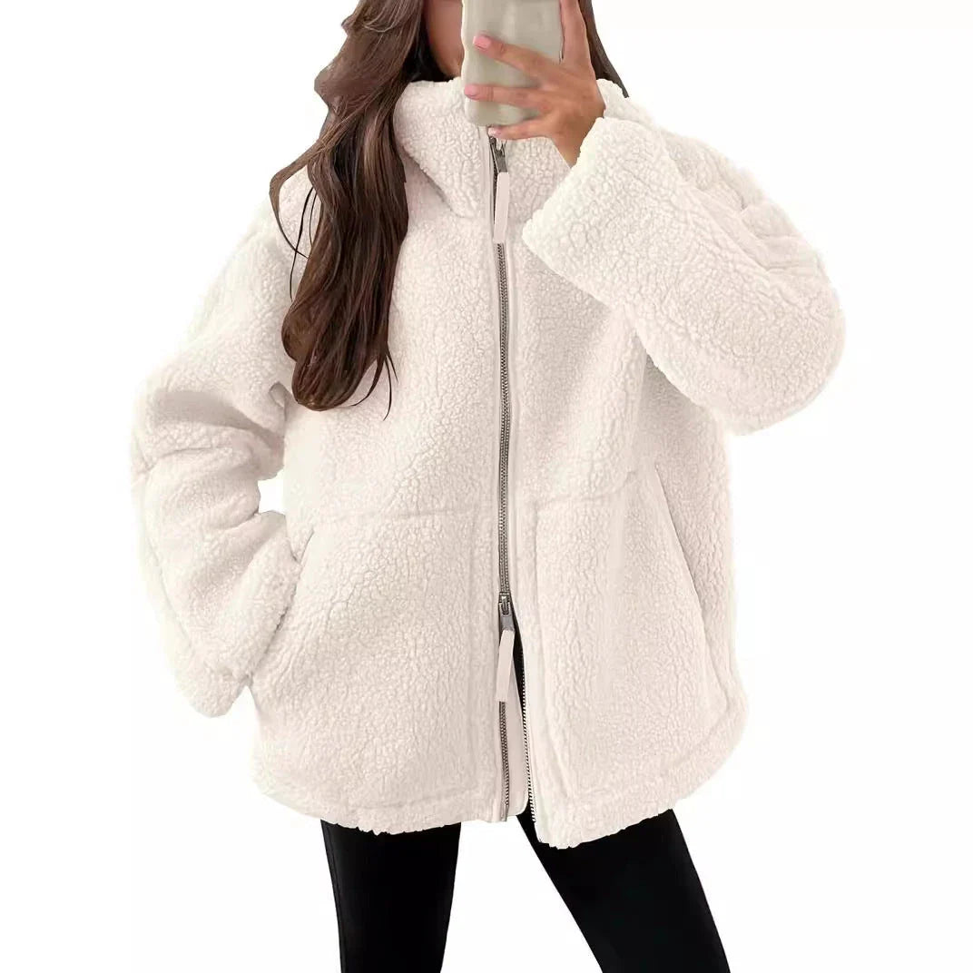 Classic padded fleece jacket in various colours for women, featuring a zip-up design and pockets