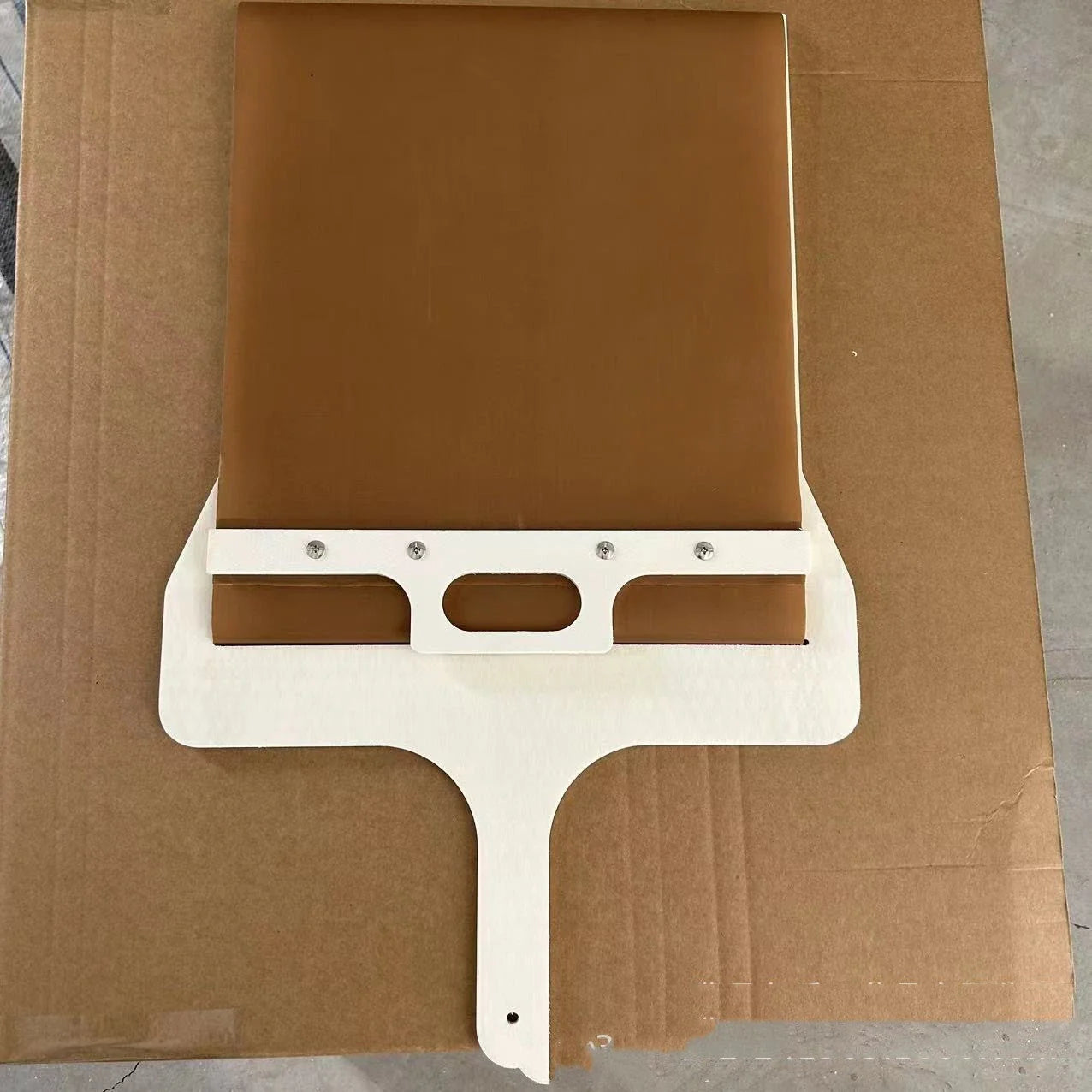 Wooden pizza peel with various size options, perfect for transferring baked goods from oven to table