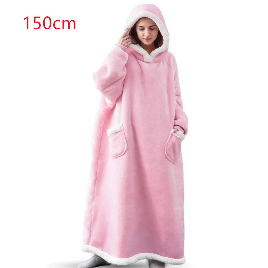 Comfy oversized TV hoodie blanket in various stylish colors, perfect for cozy movie nights and relaxation at home.
