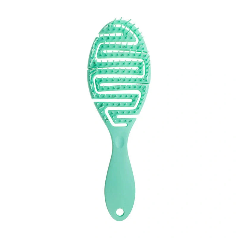 Stylish Massage Comb in various colours offering a soothing scalp massage and modern, minimalist design