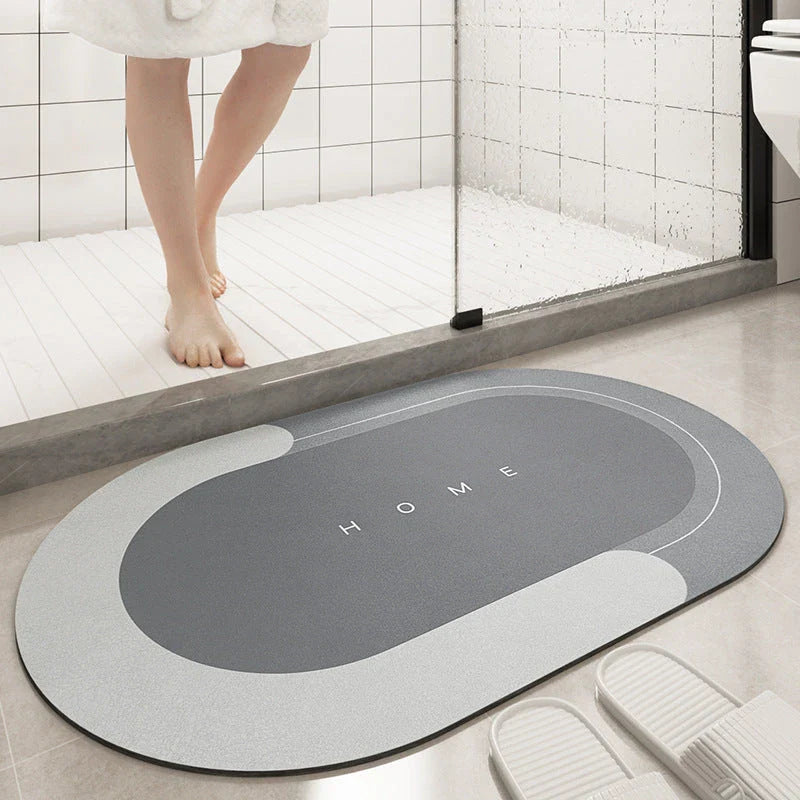 Plush, machine-woven bathroom mat with non-slip surface, available in rectangle and oval shapes in a variety of colours.