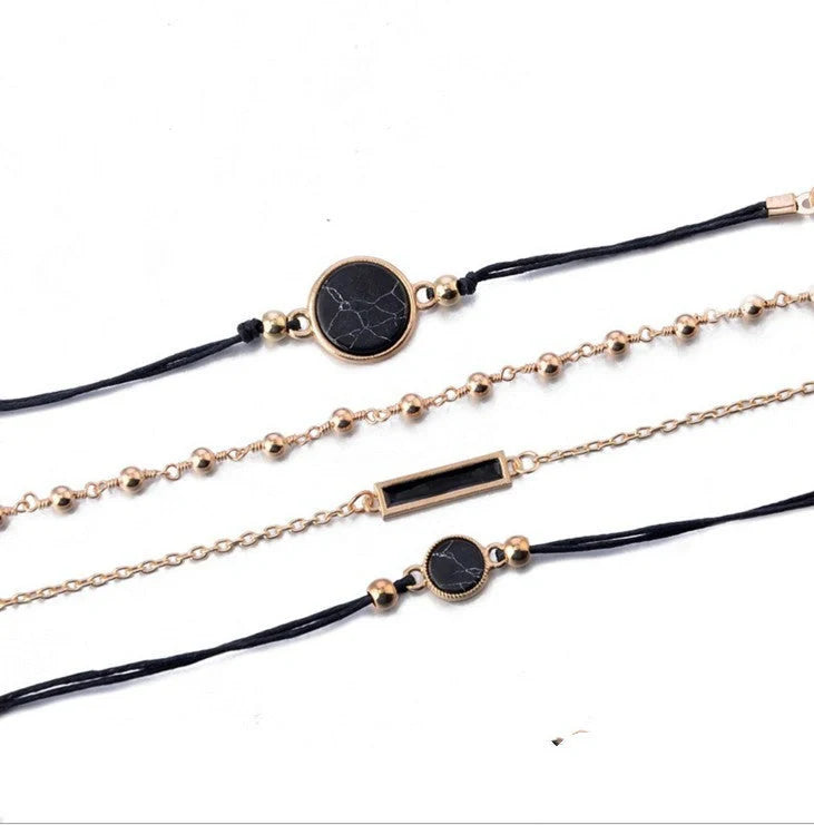 Sleek black geometric bracelet with turquoise accents, handcrafted with premium alloy for a modern, sophisticated look