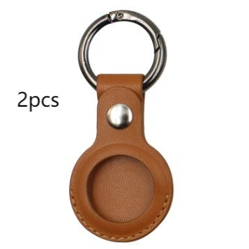 Premium leather AirTag keychain case in various colors, providing durable protection and stylish carry for your Apple tracking device