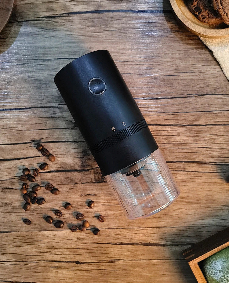Portable electric coffee grinder with adjustable grind settings, USB-C charging, and dishwasher-safe components for fresh ground coffee on the go.