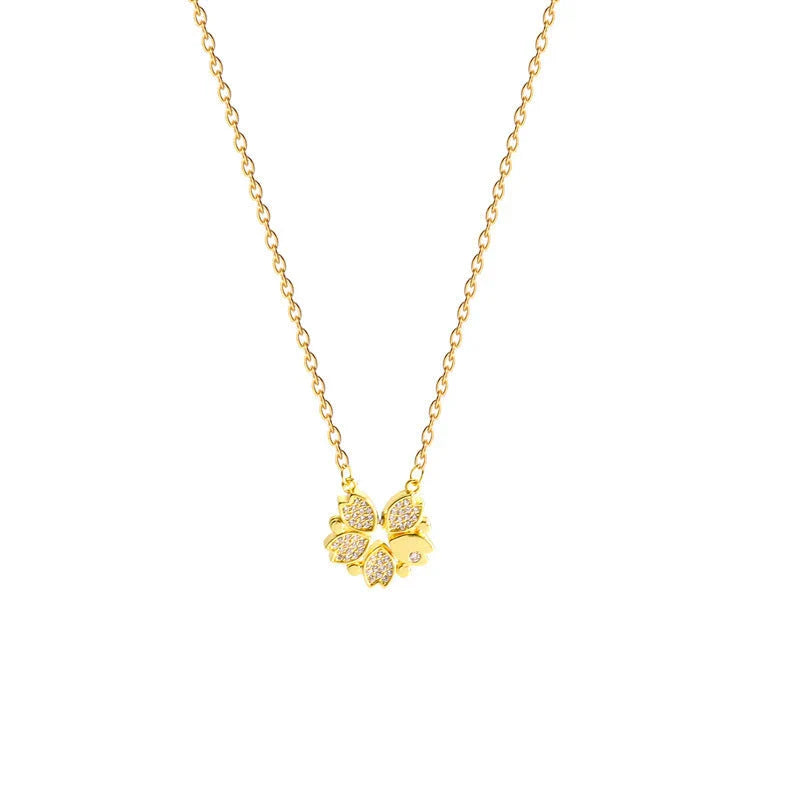 Luxe four-leaf clover pendant necklace crafted with stainless steel and crystal heart charm for women