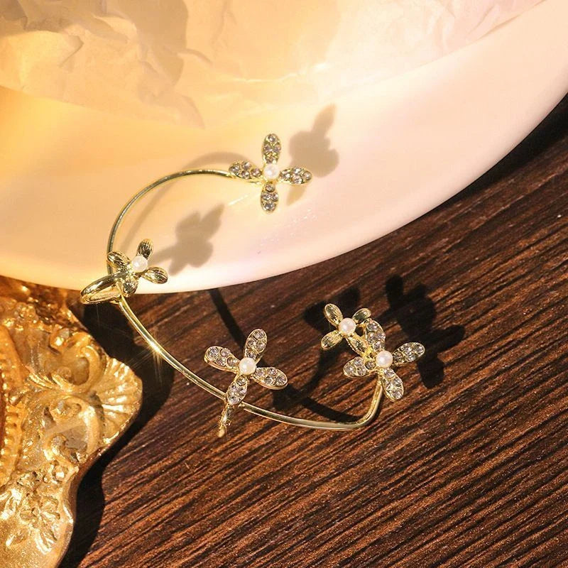 Sparkling butterfly-shaped ear cuffs with zirconia stones, available in gold and silver alloy finishes