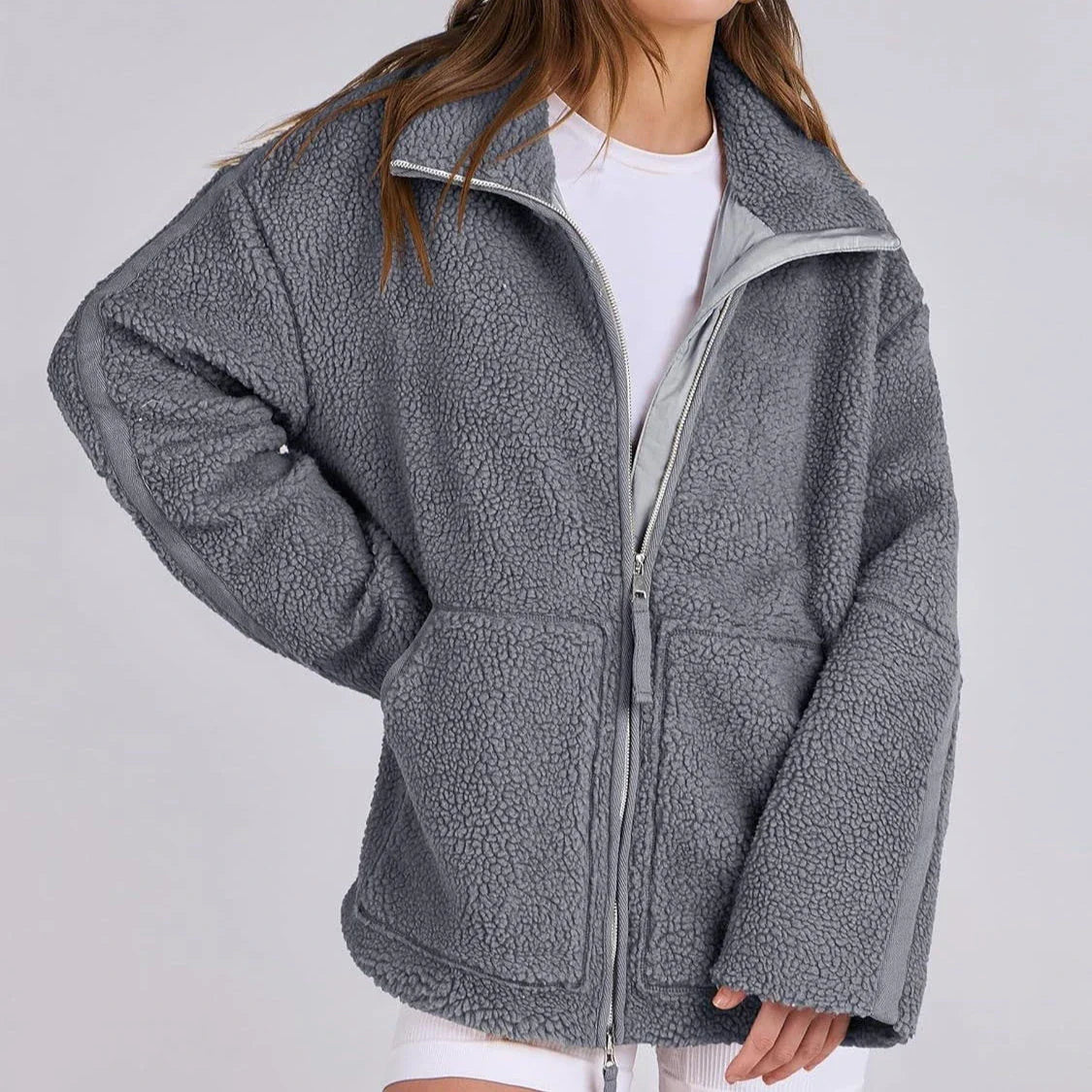 Classic padded fleece jacket in various colours for women, featuring a zip-up design and pockets