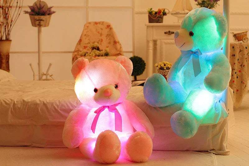 A soft and cuddly teddy bear plush toy with captivating color-changing LED lights, perfect for bringing wonder and delight to a child's room.