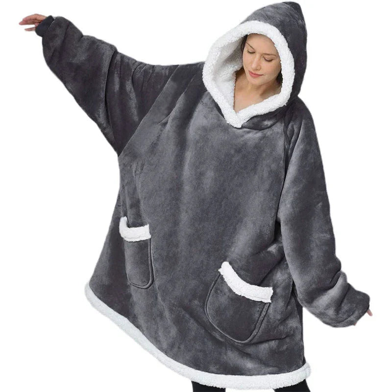 Comfy oversized TV hoodie blanket in various stylish colors, perfect for cozy movie nights and relaxation at home.