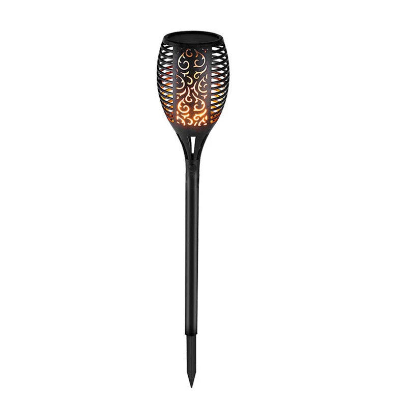 Elegant solar-powered garden lights illuminating a pathway in a lush British garden
