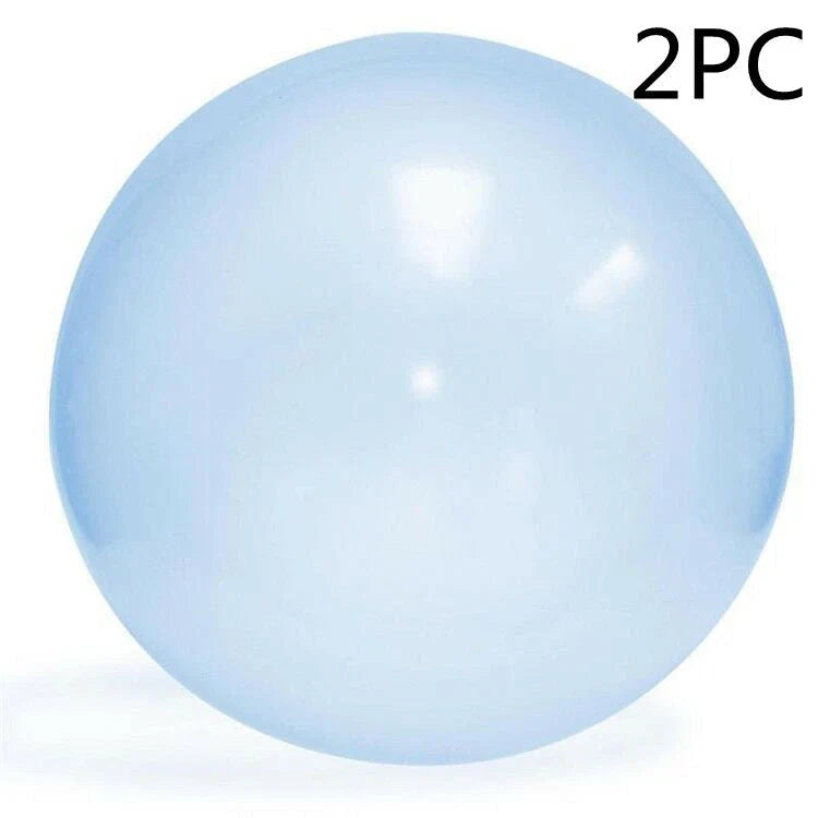 Oversized inflatable bounce balls in various vibrant colors for fun parties and celebrations