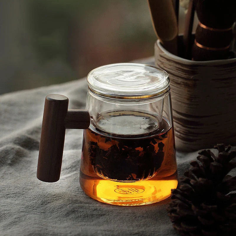Premium borosilicate tea infuser cup with natural walnut handle, available in various sophisticated colour options