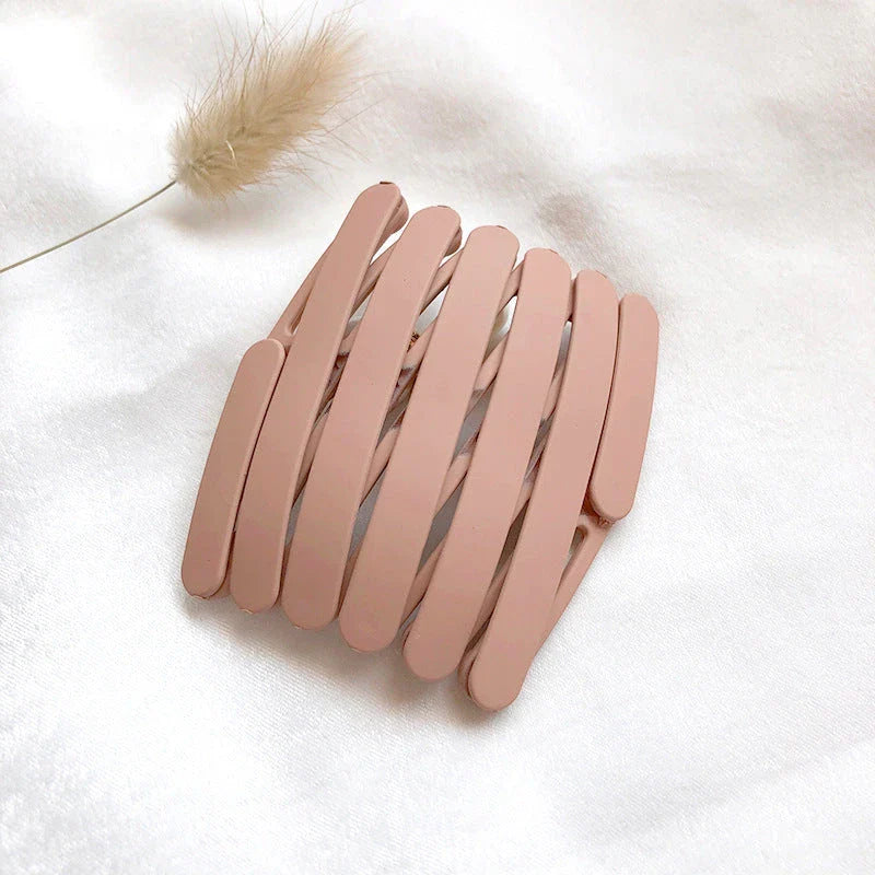 Retractable Pocket Hair Band - A stylish, secure, and convenient hair accessory that can be easily stored in your pocket or bag.