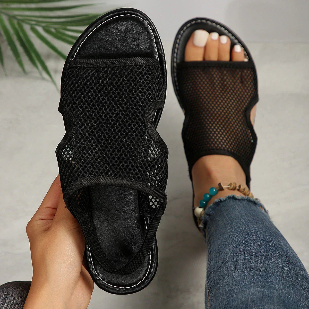 Breathable mesh sandals in various colors, featuring a lightweight design for summer comfort and style