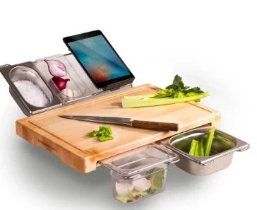 Bamboo cutting board with plastic storage trays for organizing and containing chopped food items
