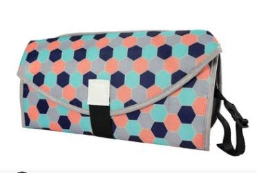Versatile baby changing mat in various colourful patterns, made of durable 420 Oxford fabric and waterproof material.