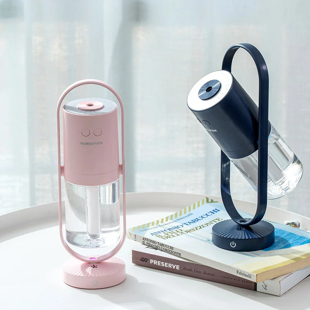 Compact USB Powered Desktop Humidifier with Ambient Lighting, featuring adjustable mist nozzle and romantic starry projection