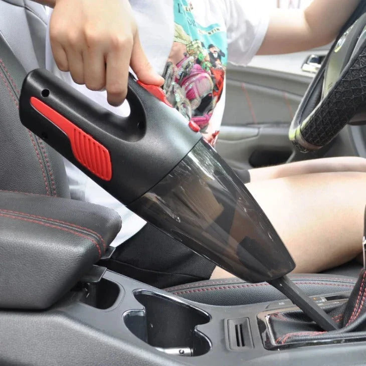 Powerful handheld vacuum cleaner with attachments for cleaning small car interiors