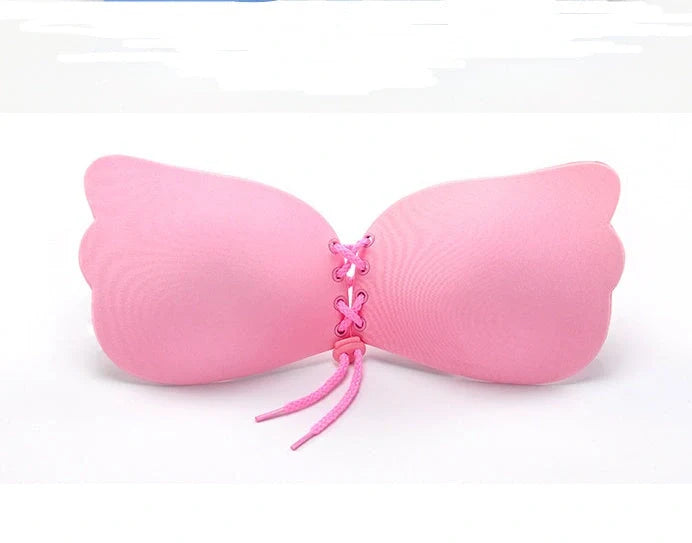 Adhesive strapless bras for women in various colours and sizes, designed for seamless support and a flawless look under backless, low-cut, and strapless dresses.