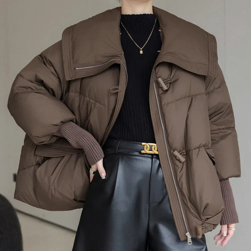 Premium down-filled puffer jacket with faux fur collar, available in brown, black, and white colours