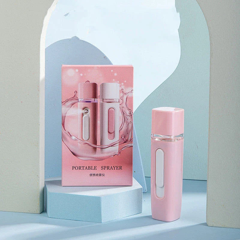 Portable facial mister with 38ml water tank, transforms water into fine mist for hydrating skin on the go