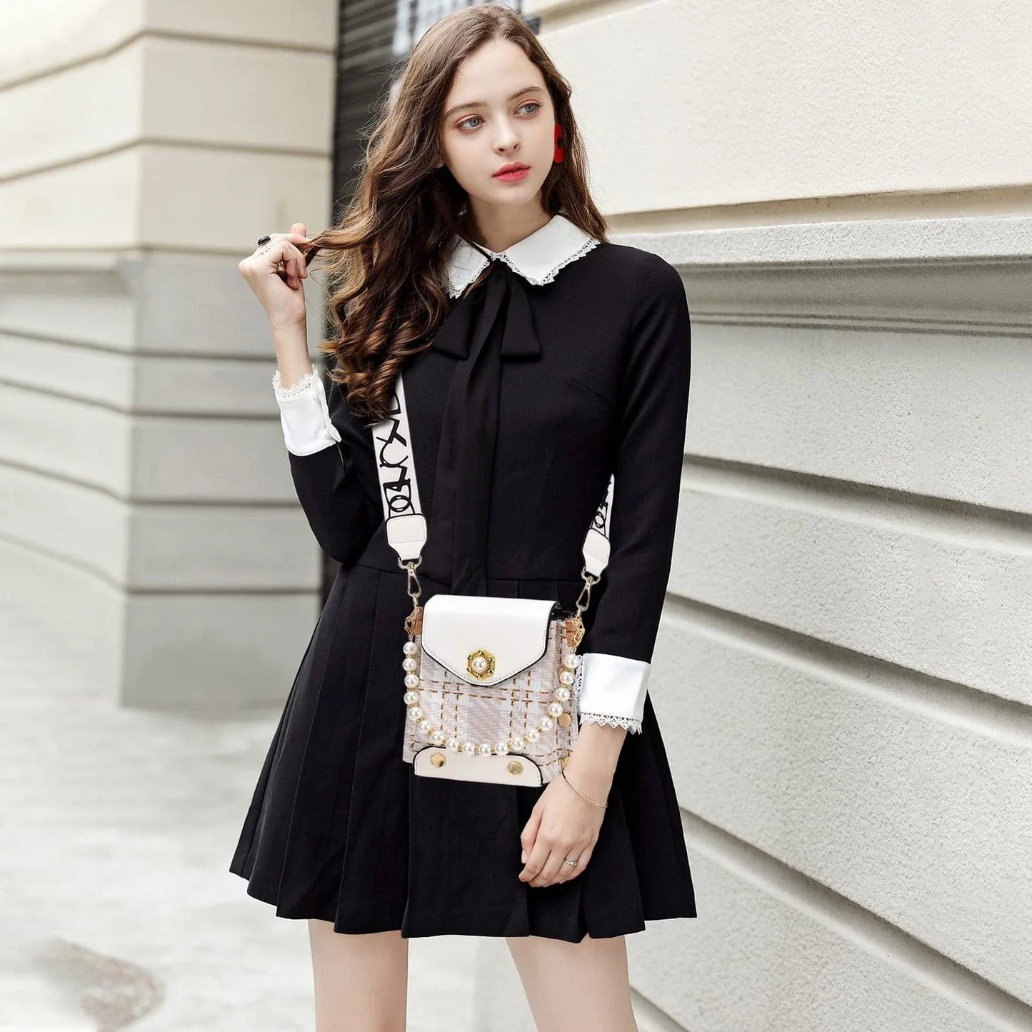 Premium crossbody phone bag with elegant pearl charm, made of durable PU leather and available in multiple color options