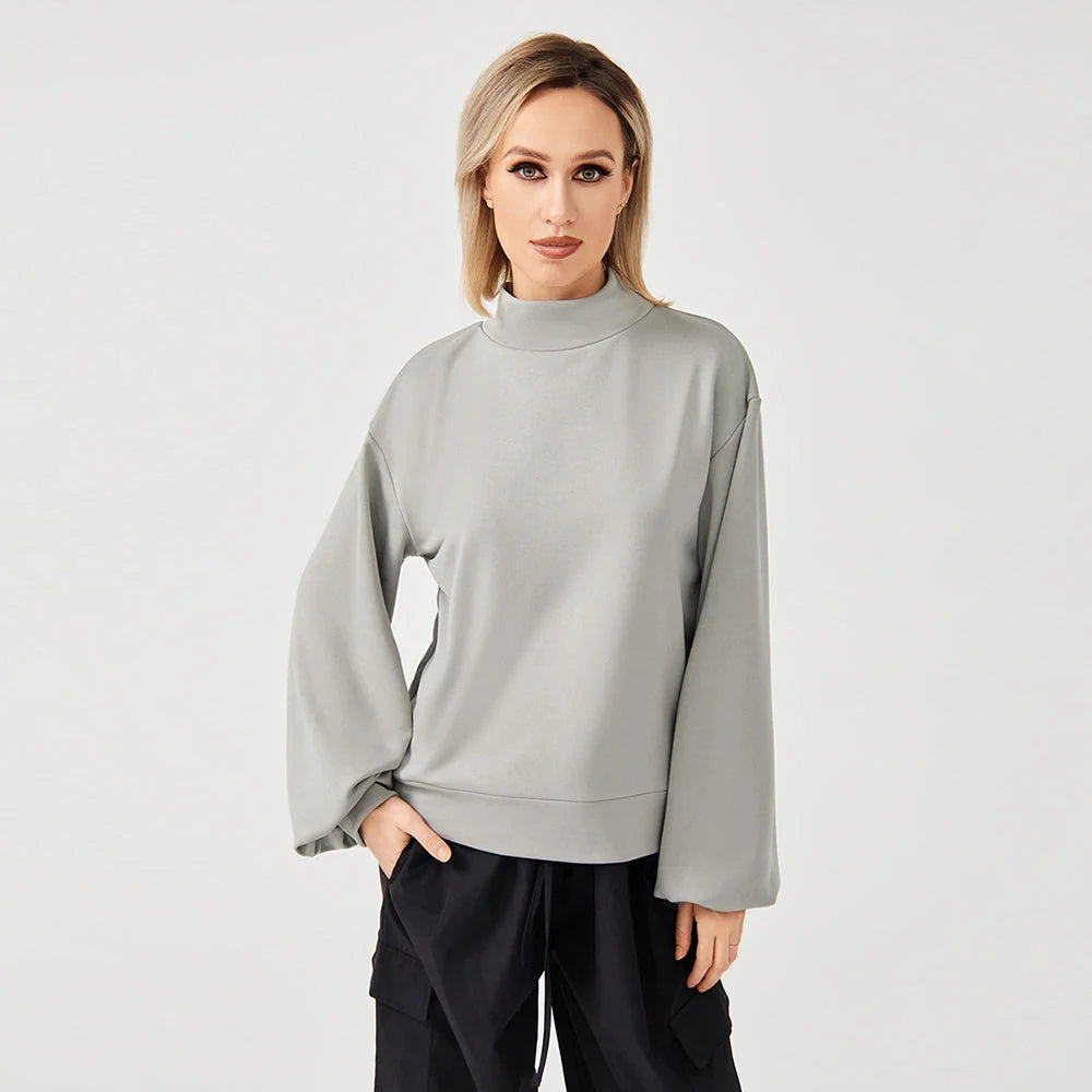 Soft, cosy women's sweatshirt in black, grey, and coffee colours with a relaxed, flattering fit