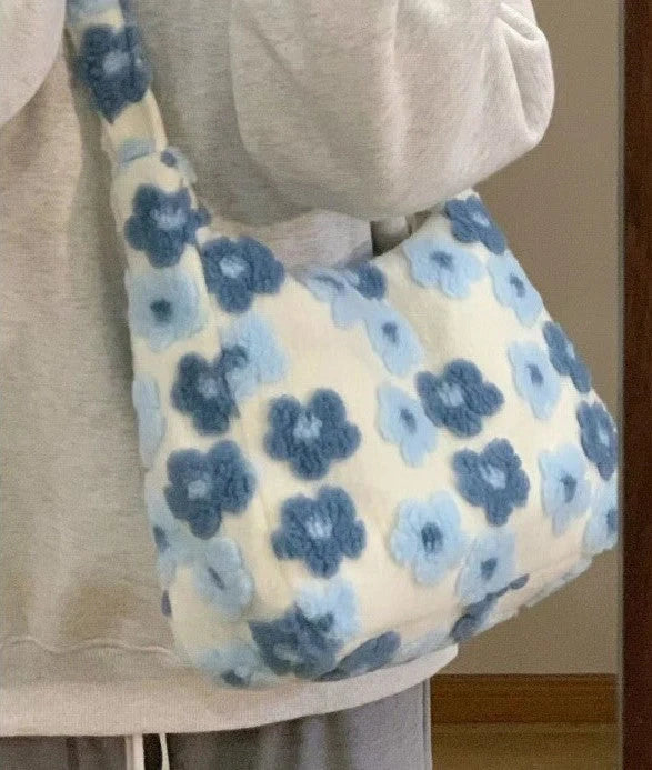 Large capacity fur bag with floral elements and adjustable straps