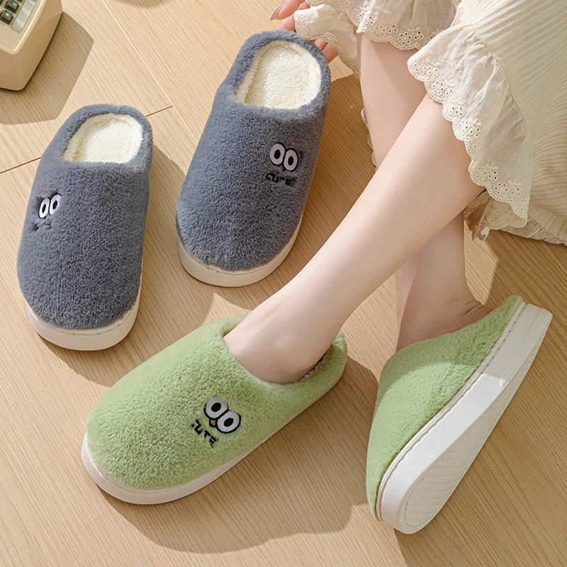 Cozy cartoon-themed slippers for couples, featuring plush material and non-slip rubber soles in a variety of vibrant colors.