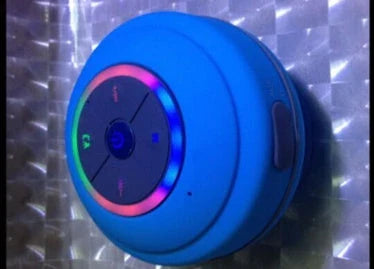 Compact waterproof Bluetooth speaker in various colours, with hands-free calling and premium audio performance