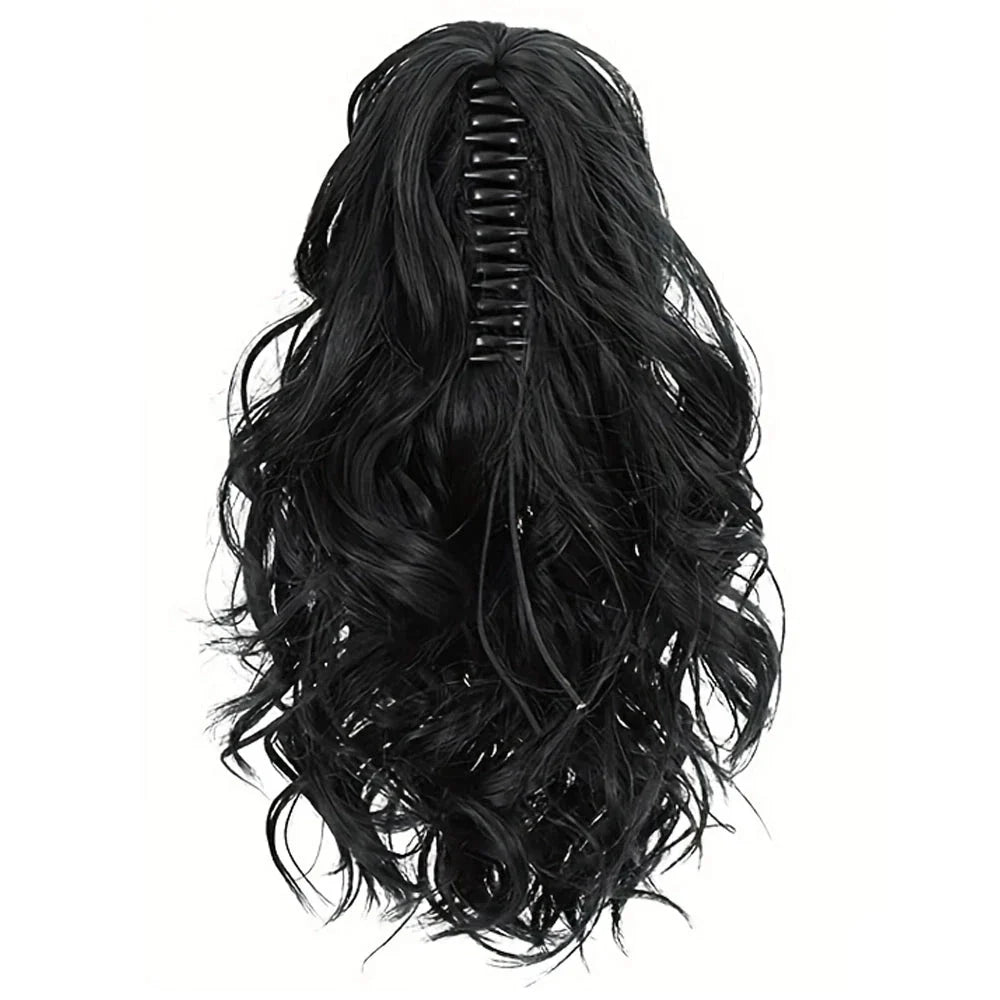 A close-up view of the 12-Inch Short Wavy Claw Clip Ponytail Extension in black, showcasing its natural texture and seamless blending capabilities.