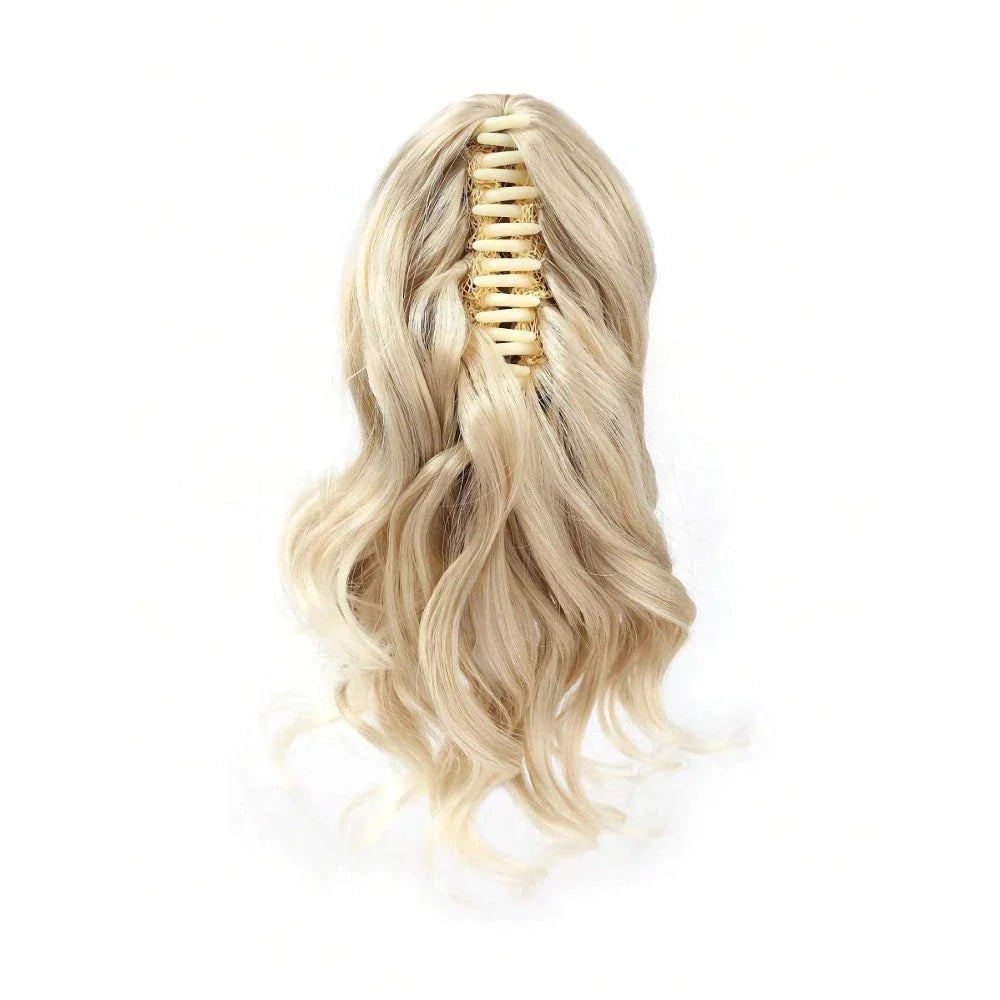 A close-up view of the 12-Inch Short Wavy Claw Clip Ponytail Extension in black, showcasing its natural texture and seamless blending capabilities.