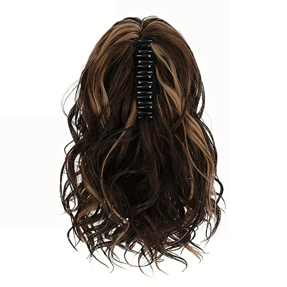 A close-up view of the 12-Inch Short Wavy Claw Clip Ponytail Extension in black, showcasing its natural texture and seamless blending capabilities.
