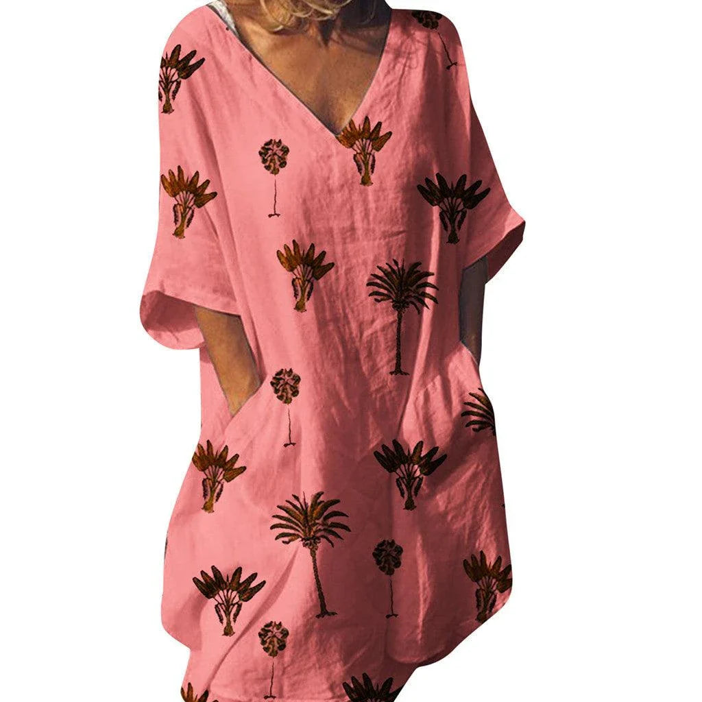 Trendha Leaf Print V-Neck Casual Flared Dress in blue with a vibrant leaf pattern, v-neck, and flared skirt design