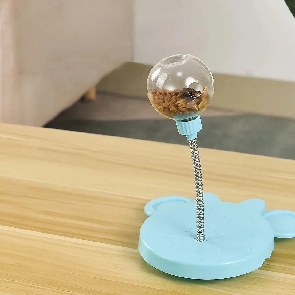Interactive pet puzzle food ball toy made of durable plastic for cats and dogs, designed to dispense treats and provide mental stimulation.