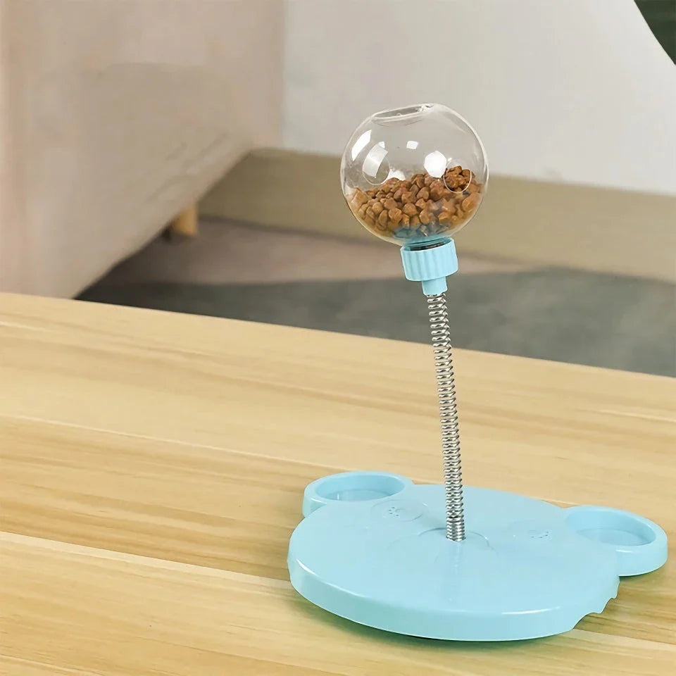 Interactive pet puzzle food ball toy made of durable plastic for cats and dogs, designed to dispense treats and provide mental stimulation.