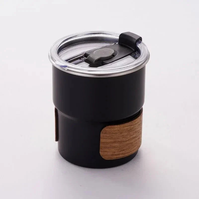 Portable stainless steel camping coffee mug with wooden lid and splash-proof design