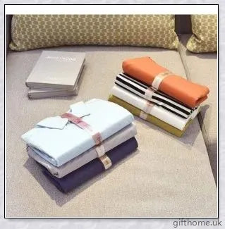 Dress Book - Space-Saving Clothes Folder Organiser with pink and gold colour options, neatly folded clothes, and a tidy wardrobe.