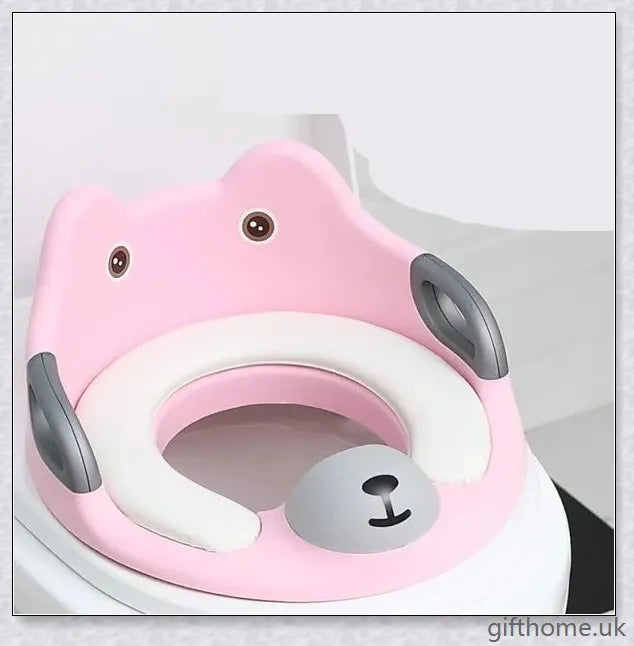 A soft, spongy toilet seat in a charming bear-themed design, providing comfort and safety for your child's bathroom.
