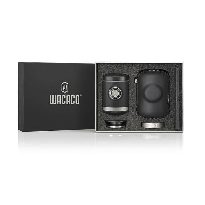 Portable espresso maker with a sleek black design, featuring a naked portafilter and manual operation for crafting premium coffee on the go.