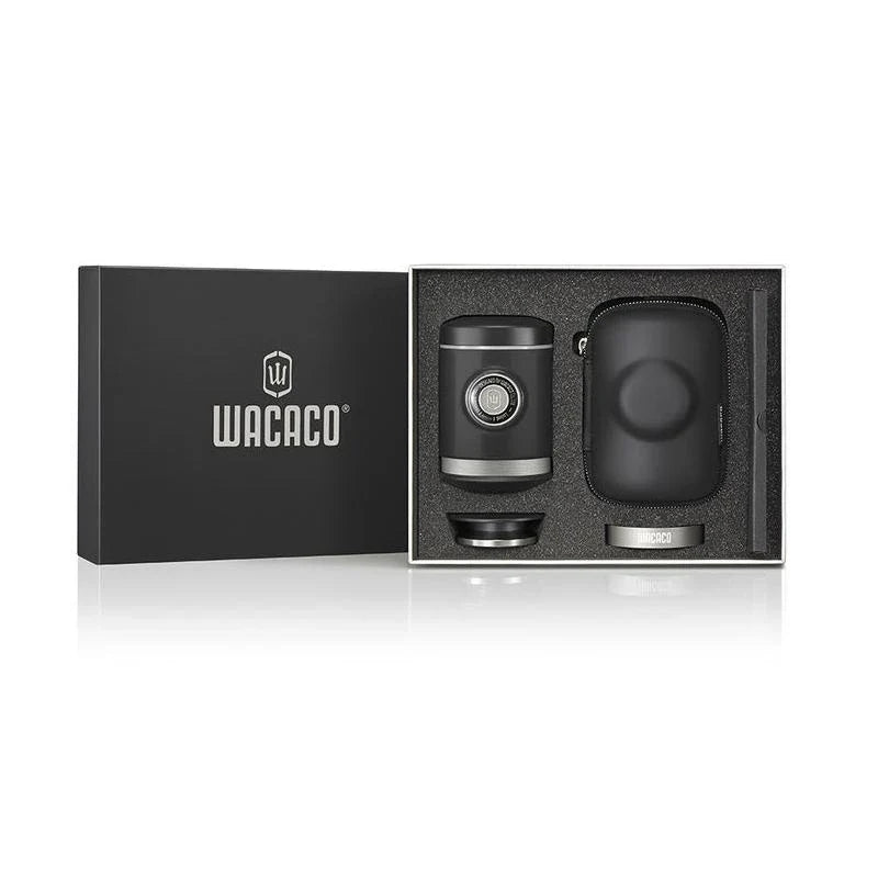 Portable espresso maker with a sleek black design, featuring a naked portafilter and manual operation for crafting premium coffee on the go.